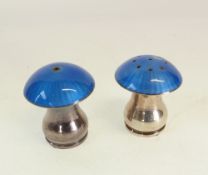 A PAIR OF DANISH STERLING SILVER AND BLUE GUILLOCHE ENAMEL MUSHROOM PATTERN SALT AND PEPPERPOTS, 1.