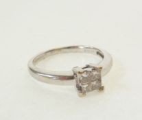 AN 18CT WHITE GOLD DIAMOND RING, top square set with four small square cut diamonds, Birmingham, 3g