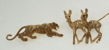 A 9CT GOLD TIGER BROOCH AND A 9CT GOLD DEER BROOCH, each with gem set eyes, Birmingham,10.9g