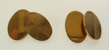 A PAIR OF 9CT GOLD ENGINE TURNED DOUBLE OVAL CUFFLINKS, Birmingham 1991, 14.2g
