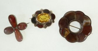 A SCOTTISH SILVER, HARDSTONE AND PASTE SET BROOCH, A HARDSTONE SET PLAID BROOCH AND A HARDSTONE