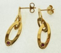 A PAIR OF ROBERTO COIN 18CT GOLD AND RUBY EARRINGS, formed of three graduated oval loops,3.1g, in