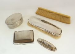 A SILVER BACKED CLOTHES BRUSH, Birmingham 1926, A SILVER BACKED NAIL BUFFER, Birmingham 1916, TWO
