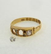 *A VICTORIAN 18CT GOLD RING, set with two old cut white stones (one stone loose) and a vacant centre
