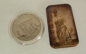 MADISON MINT FINE SILVER `STATUE OF LIBERTY` 1OZ INGOT AND THE GLASS STAND AND AN UNCIRCULATED