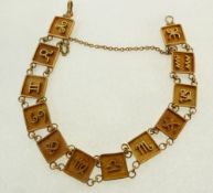 A GOLD BRACELET, WITH TWELVE SQUARE LINKS, EACH WITH A ZODIAC SYMBOL, 8g