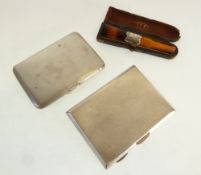 AN ENGINE TURNED SILVER CIGARETTE CASES, 3 ½" (8.9cm) Birmingham 1929, 2.4oz AND ANOTHER 3 ¼" (8.