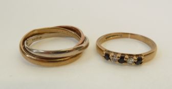 A 9CT GOLD RUSSIAN WEDDING RING, import mark London 1987, AND A GOLD RING SET WITH TWO MELEE DIAMOND