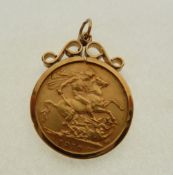 AN EDWARD VII (1910) GOLD SOVEREIGN, loose mount in 9ct gold frame as a pendant, London 1972