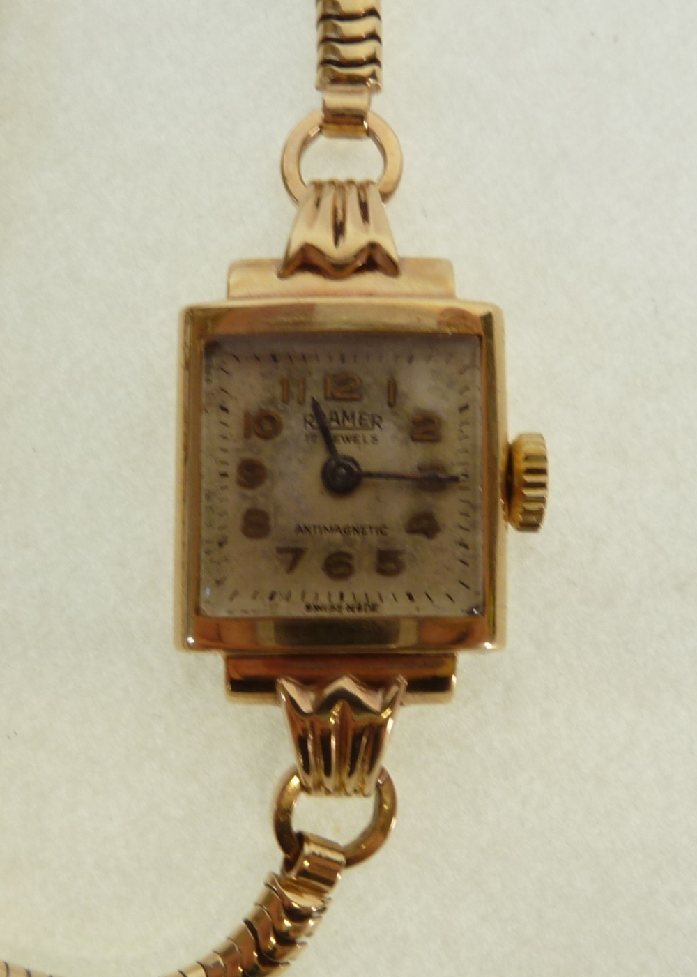 A LADY`S ROAMER 9CT GOLD CASED WRIST WATCH, mechanical movement, silvered square Arabic dial,