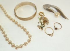 A 9CT GOLD CULTURED PEARL RING, A SIMULATED DIAMOND SOLITAIRE RING, A SIMULATED PEARL NECKLACE,
