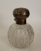 A CUT GLASS GOBULAR PERFUME BOTTLE, with repousse hinged silver lid and collar, Sheffield 1941,