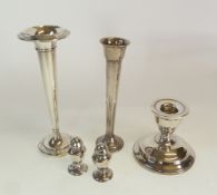 A WEIGHTED MARKED STERLING SILVER TRUMPET VASE, with foliate engraved turn-over rim and circular