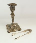 A VICTORIAN ADAM STYLE WEIGHTED SILVER CANDLE STICK, shaped square base with neoclassical design,