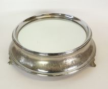 AN EARLY TWENTIETH CENTURY ELECTROPLATE WEDDINGCAKE STAND, circular waisted form with mirrored