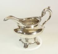 A VICTORIAN SILVER CREAM JUG, BY RICHARD PIERCE & GEORGE BURROWS, bombe shaped, with gadroon border,
