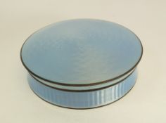 A MARKED STERLING SILVER AND PALE BLUE GUILLOCHE ENAMEL CIRCULAR POWDER JAR AND COVER, enamelled all