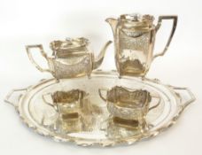 A FOUR PIECE ELECTROPLATED TEA SET, canted oblong form, with cyma edge, with stamped floral