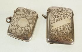 TWO FOLIATE ENGRAVED SILVER VESTA CASES, Birmingham 1919, 1.95oz gross (2)