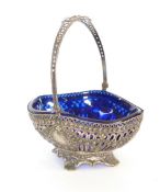 A CONTINENTAL 800 STANDARD PIERCED SILVER SWING HANDLE BASKET, with floral decoration, with blue