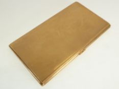 A 9CT GOLD ENGINE TURNED CIGARETTE CASE, 6" (15.2cm) long, London 1946, 240g