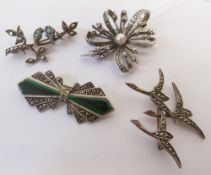 A MARCASITE AND MALACHITE BOW BROOCH, A MALACHITE, TURQUOISE AND PASTE BROOCH WITH ARTICULATED BIRDS