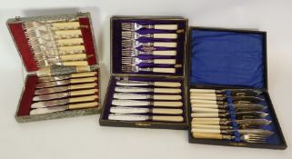 THREE CASED SETS OF SIX FISH KNIVES AND FORKS, one set with silver ferrules, two sets with ivorine