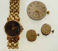 LADY`S ROLLED GOLD WRIST WATCH, with quartz movement, circular black dial inscribed `Gucci` with