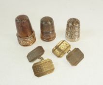 A HALLMARKED SILVER THIMBLE, TWO SILVER METAL THIMBLES AND A PAIR OF SILVER ENGINE TURNED CUFFLINKS,