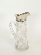 A GOOD QUALITY SILVER MOUNTED CUT GLASS WATER JUG BY GORHAM, Birmingham 1912, 10 ½" (26.6cm) high