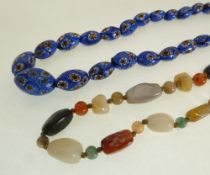 A NECKLACE OF VARIOUS HARDSTONE BEADS, AND A NECKLACE OF BLUE ENAMELLED GLASS BEADS