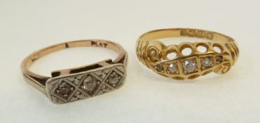 AN 18CT GOLD RING SET WITH FIVE GRADUATED MELEE DIAMONDS, to the scroll top, Birmingham 1863, 2.1g