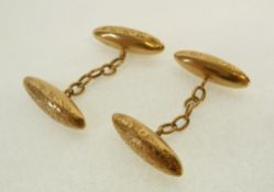 A PAIR OF EARLY TWENTIETH CENTURY 18CT GOLD FOLIATE ENGRAVED DOUBLE OVAL CUFFLINKS, 6.3g