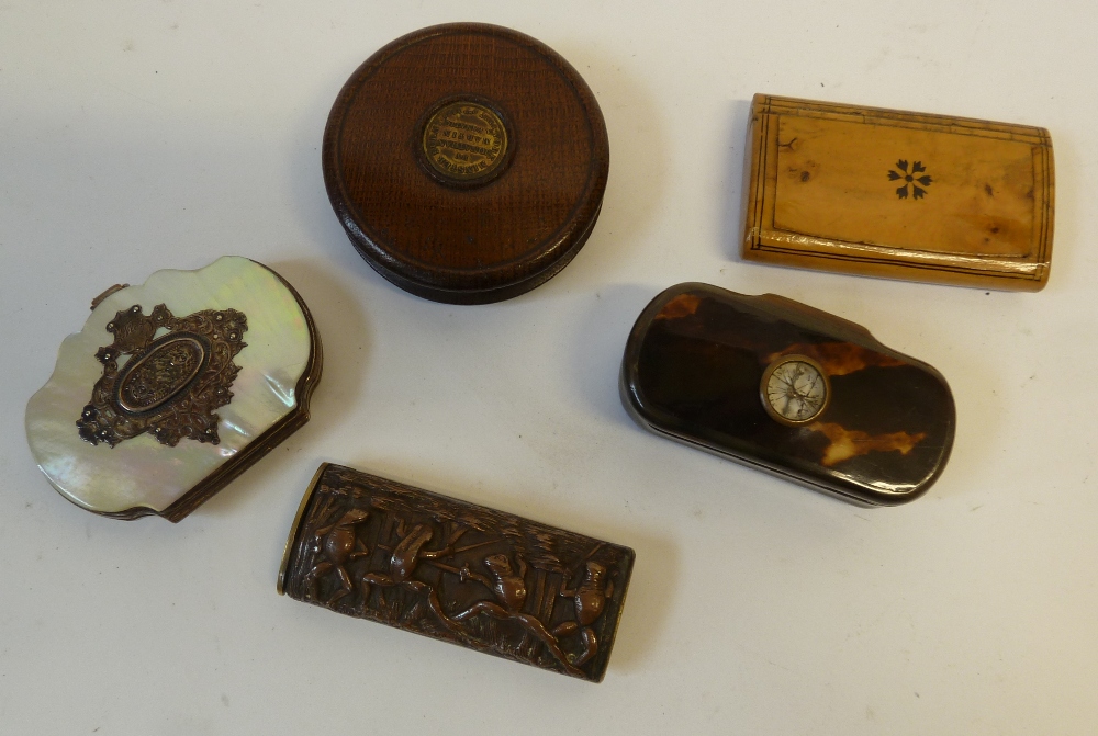 A SMALL TURNED OAK SNUFF BOX, a circular red label to the insides inscribed `York Minster was set