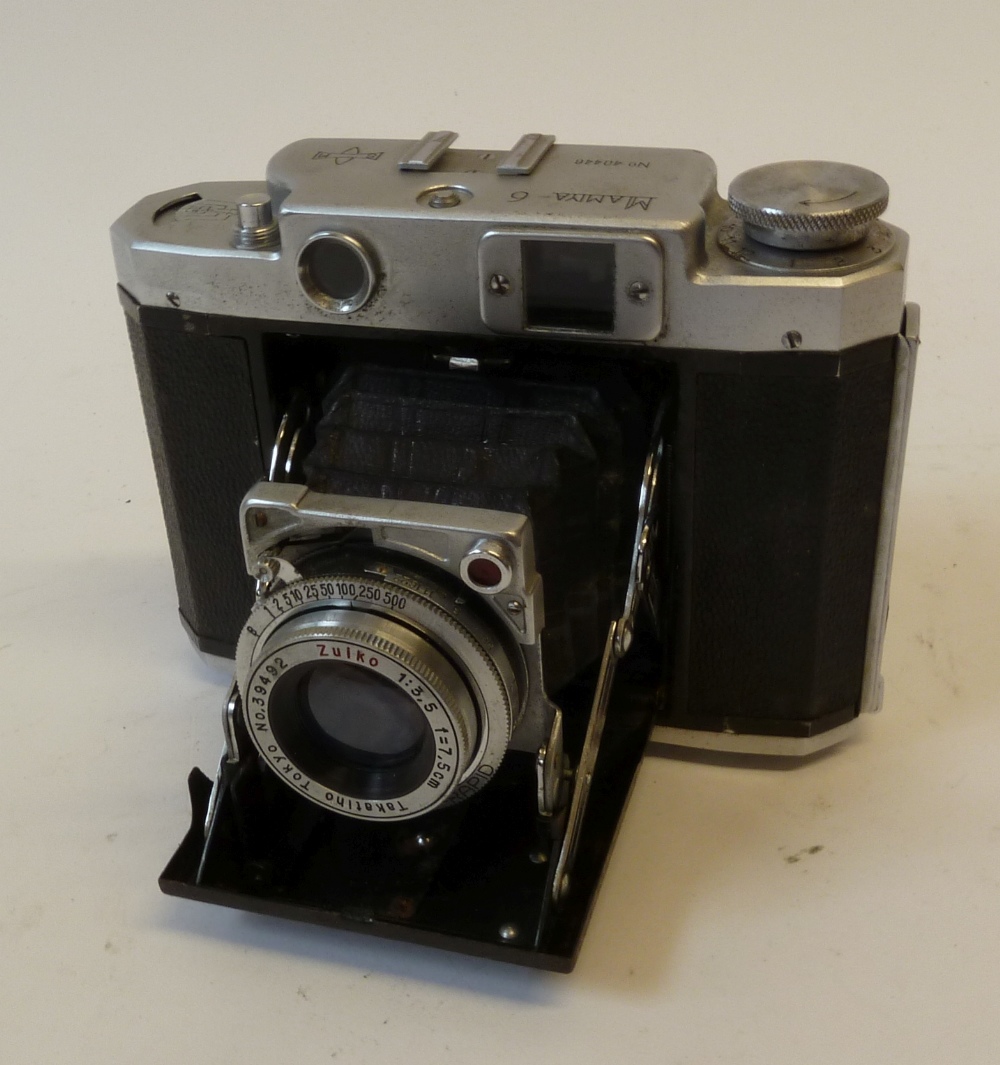 MAMIYA 6 FOLDING ROLL FILM CAMERA, (No 40446), with ZUIKO f3.5, 75mm LENS in brown leather case