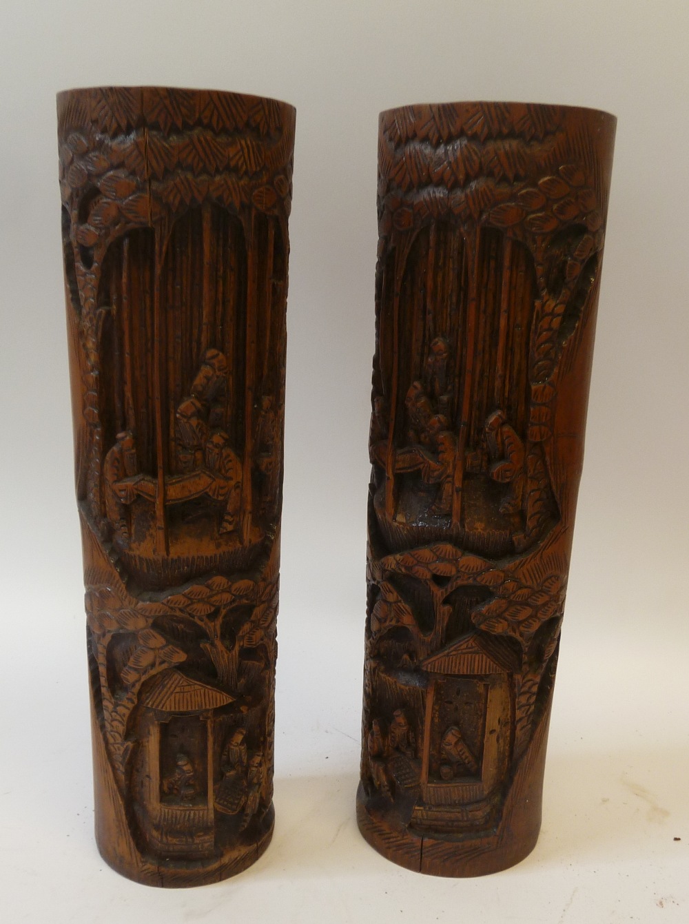 PAIR OF ORIENTAL CARVED BAMBOO VASES, decorated with figures and dwellings, 15 1/2"" (39.3cm)