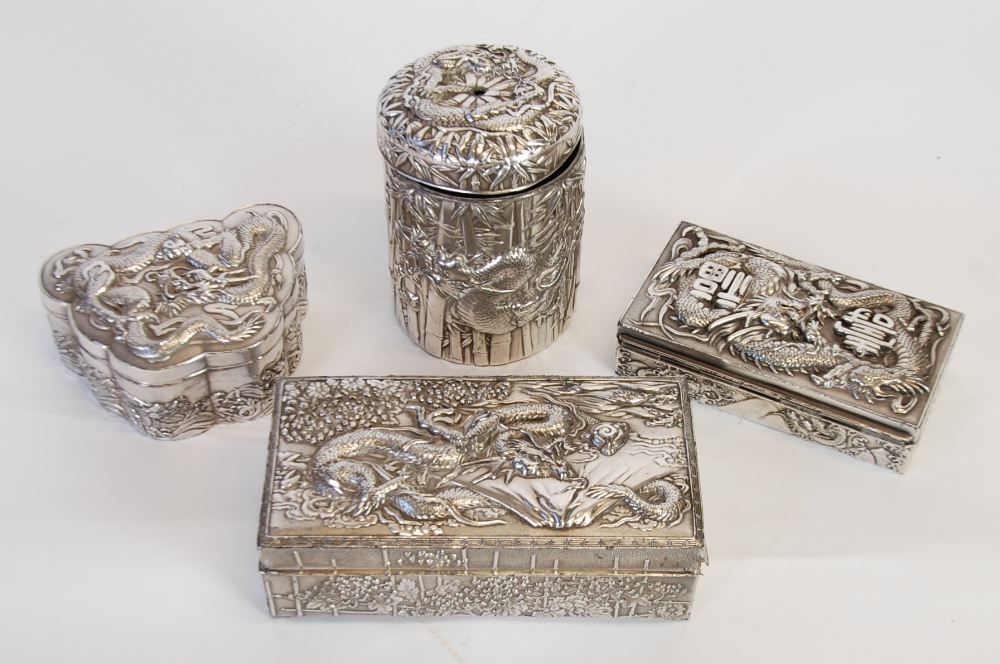 TWO EARLY TWENTIETH CENTURY ORIENTAL ANTIMONY CIGARETTE BOXES (one lid af), 7"" (17.8cm) and