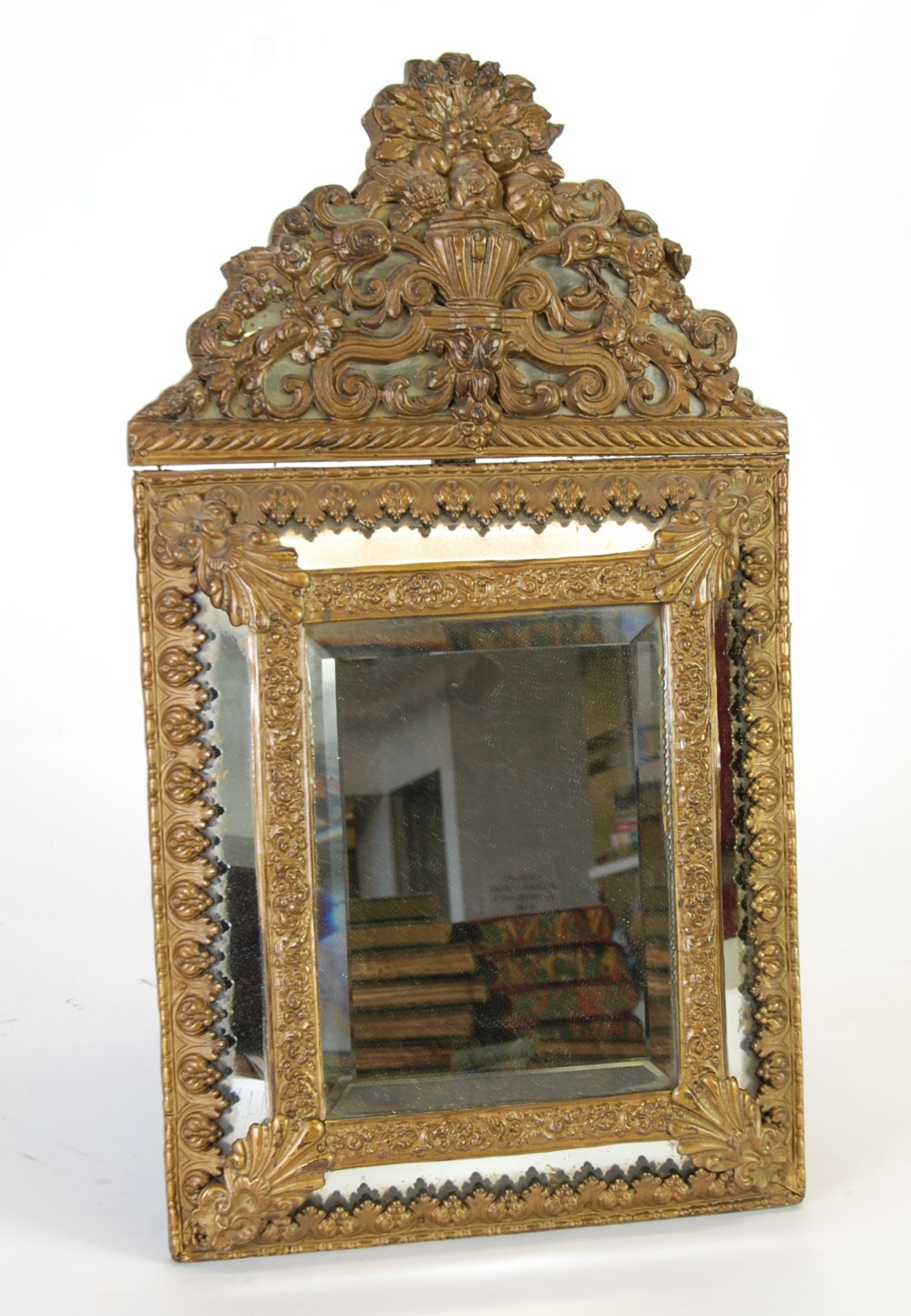 A GILT METAL FRONTED DUTCH CUSHION WALL MIRROR, with bevelled centre plate and mirror backed