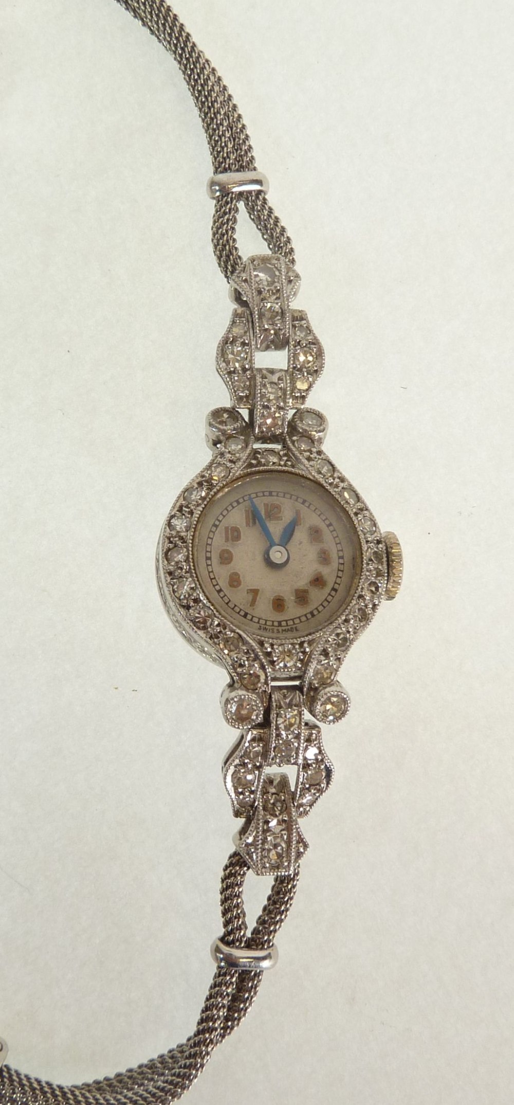 A LADY`S 9CT WHITE GOLD AND DIAMOND COCKTAIL WATCH, Swiss movement, with small circular Arabic