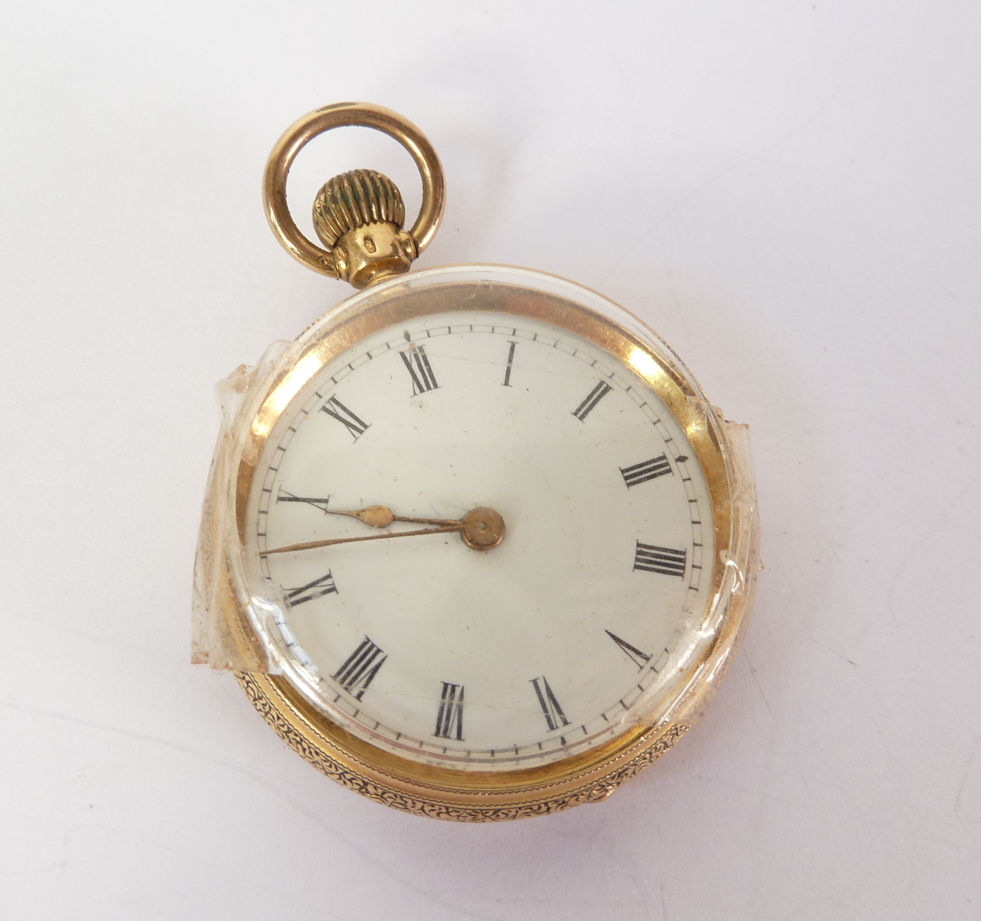 AN 18K GOLD CASED LADY`S KEYLESS FOB WATCH, 26.6 GRAMS GROSS (AF)