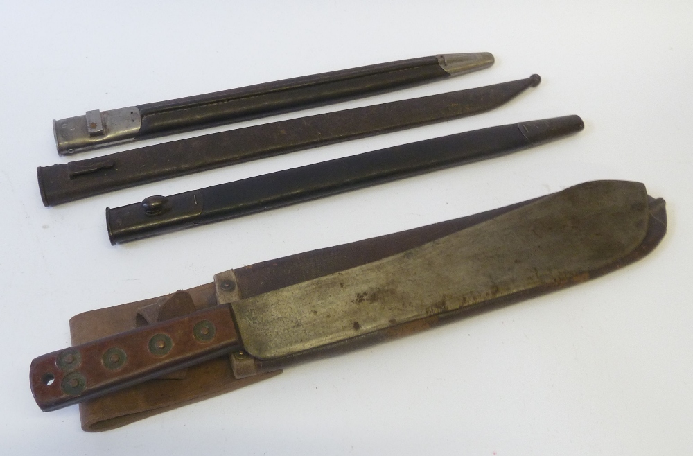 MARTINDALE & CO. LARGE MILITARY ISSUE MACHETE in brown leather sheath, TWO EARLY 20th CENTURY