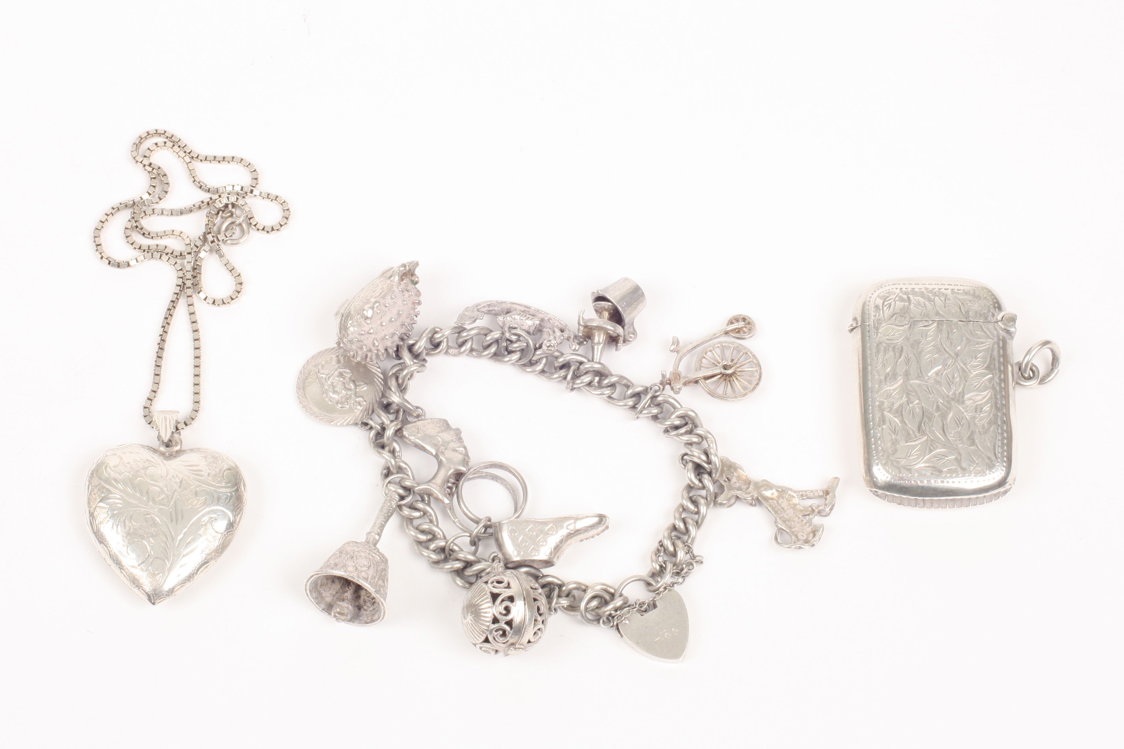 A silver charm bracelet set with 11 charms and padlock clasp, together with a silver heart shaped