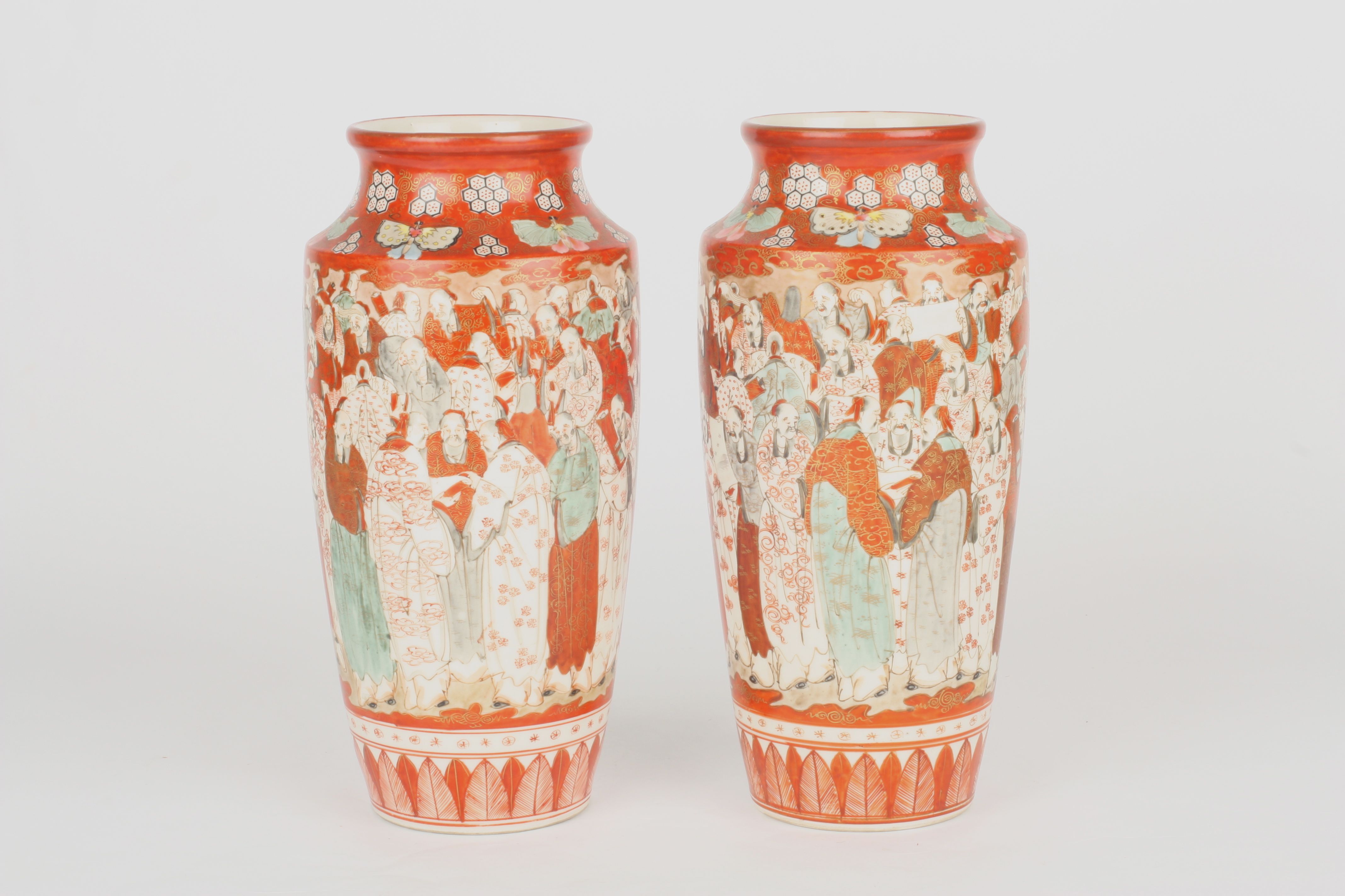 A pair of Japanese Kutani porcelain vases, circa 1900, of ovoid form, painted with a scholars