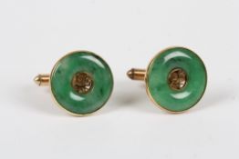 A pair of Chinese 14ct gold and jade coloured cufflinks, each formed as a jade roundel with central