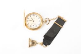 A gentleman?s Movado hunter pocket watch, with 14ct gold case, white enamel dial, with gold fob