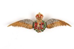 A 15ct gold and enamel Royal Flying Corps bar badge, the crest with laurel wreath and crown in