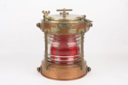 A copper ships navigation lamp, with label for Harvie Commercial Quality Birmingham, of cylindrical