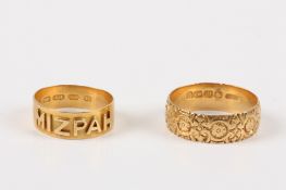 Two 18ct gold rings, comprising an 18ct gold wedding band with floral chased decoration, and an