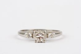 A white gold diamond solitaire ring, approximately ¼ carat, size L  In fair to good condition