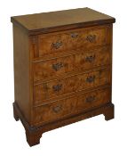 A Queen Anne style burr walnut bachelors chest, with crossbanded folding top over four long drawers